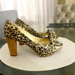FRANCO  SARTO  woman’s hi heels   3 1/2 “
heels, vivid leopard pattern  size 8 N